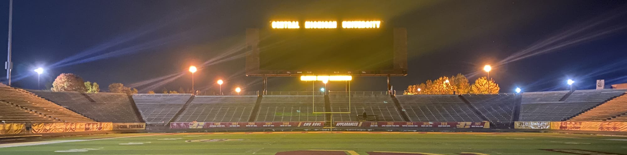 empty football stadium at night under the lights Stockton