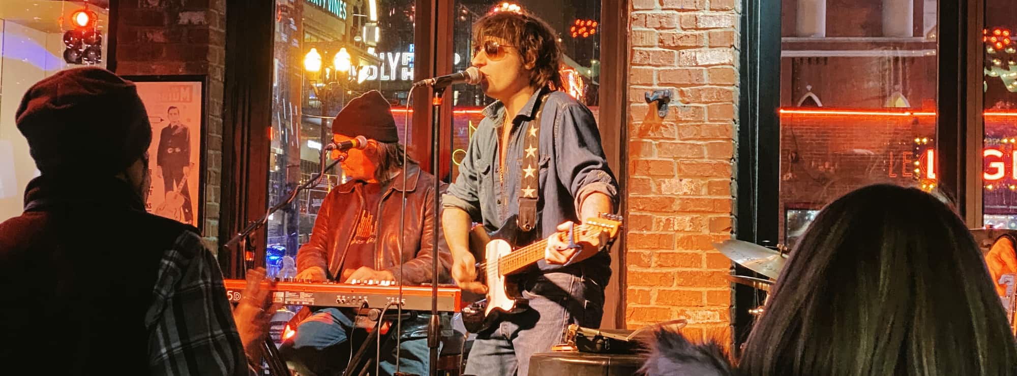 bar singer on guitar in Stockton